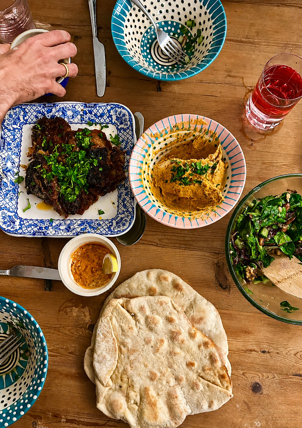 Sharing dishes set on a wooden table