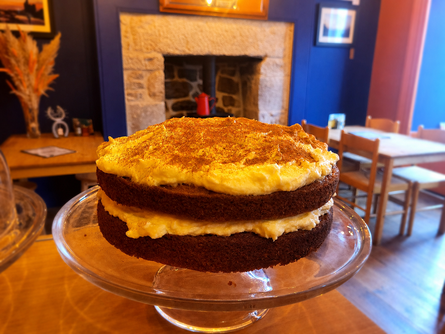 A home-made cake on a glass stand